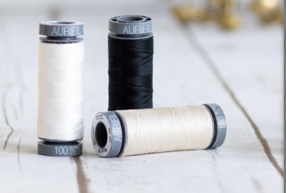 3 Aurifil 28 weight spools in neutral colours